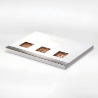 Шоколад темно-молочный в коробке (фисташка, миндаль, фундук) LADERACH, 950г